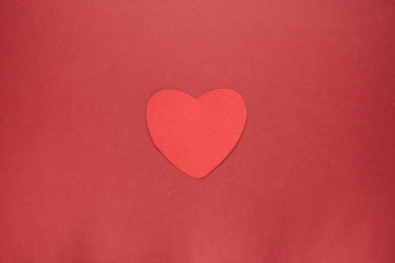 Fototapeta premium red heart on paper background