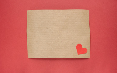 brown craft paper on red background