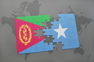 puzzle with the national flag of eritrea and somalia on a world map