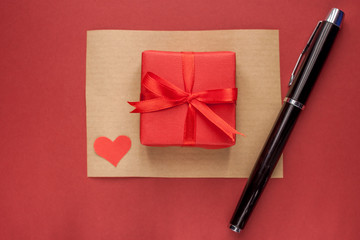 red gift box on paper background