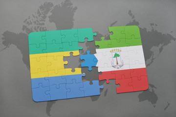 puzzle with the national flag of gabon and equatorial guinea on a world map