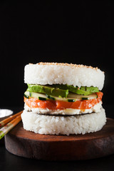 sushi menu with burger made from rice and smoked salmon, avocado