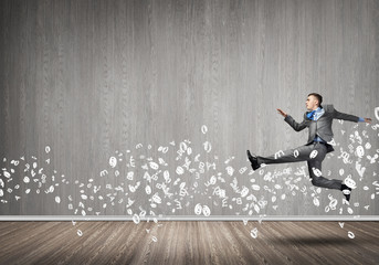 Businessman jumping high