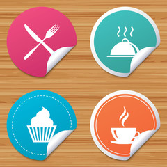 Food icons. Muffin cupcake symbol. Fork, knife.