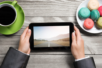 Businesswoman having coffee break