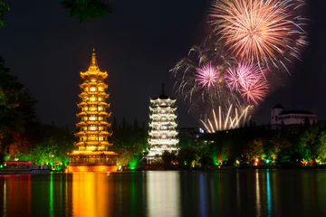 Tuinposter Vuurwerk over twee torens van Guilin China © creativefamily