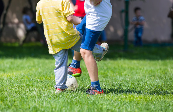 Football soccer match for children, kids playing soccer game