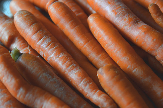 Orange carrots closeup with boh keh background