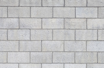 Naklejka premium Concrete block wall seamless background and texture..