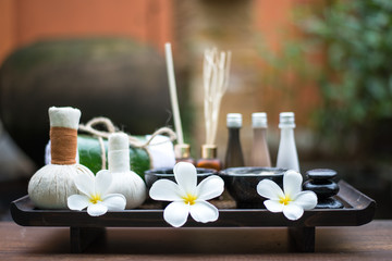 Obraz na płótnie Canvas Spa massage and treatment on the wood, Thailand, select focus .