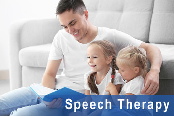 Father reading book with children at home. Text SPEECH THERAPY on background
