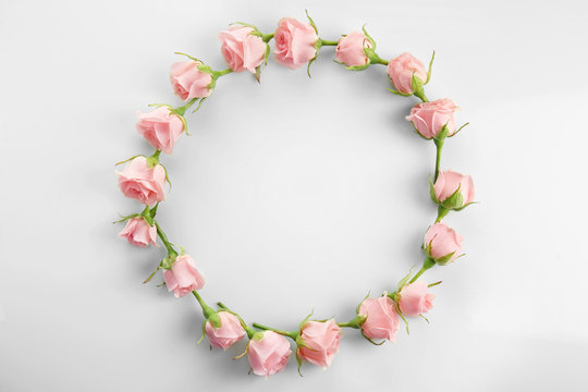Floral wreath frame on white background