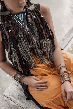 close up of boho woman hands with bracelets