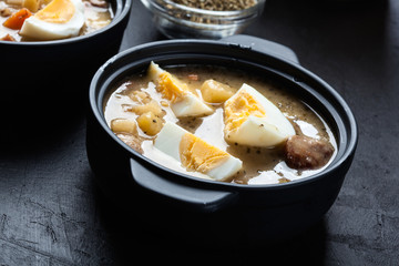The sour soup made of rye flour with eggs