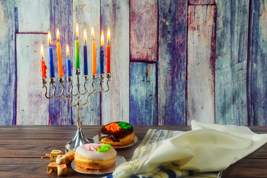 Jewish Holiday symbol Hanukkah background with menorah