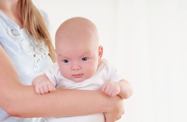 little cute baby on mother's hand