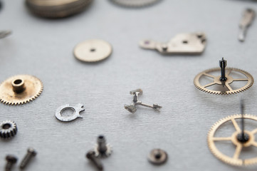 Detail of watch machinery on the table.
