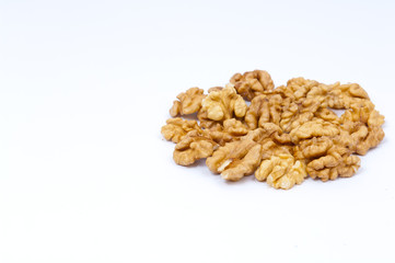 Pile of walnuts on white background