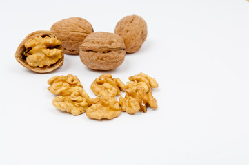 Pile of walnuts on white background