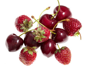 strawberry with red cherries on a white background