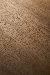 Water droplets on a wooden surface