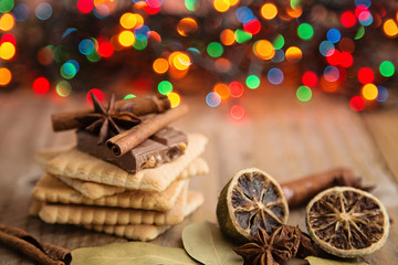 Close-up of christmas bisquits with christmas lights at backgrou