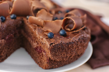 Delicious chocolate cake with blueberry, closeup