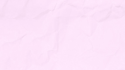 Crumpled light pink paper texture or paper background for design with copy space for text or image.