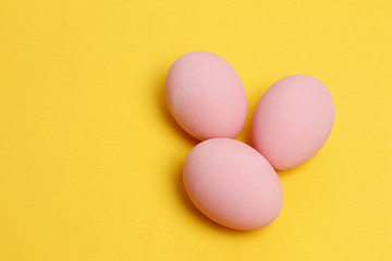Preserved egg on yellow background, Asian Traditional Food, pink
