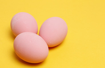Preserved egg on yellow background, Asian Traditional Food, pink
