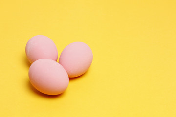 Preserved egg on yellow background, Asian Traditional Food, pink