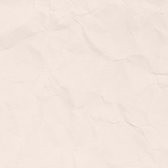 Crumpled light brown paper texture or paper background for design with copy space for text or image.