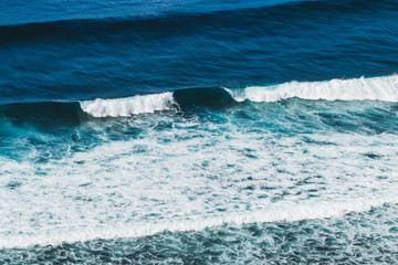 Ocean view from cliff coast, Bali sea landscape, look down from