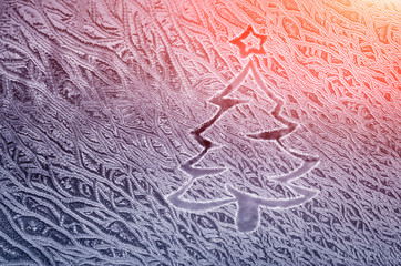 Christmas Tree on a frozen glass