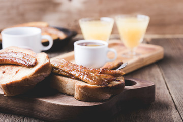 Brioche sandwiches with bananas in caramel sauce