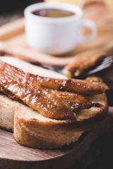 Brioche sandwiches with bananas in caramel sauce