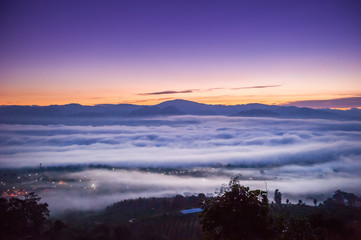 Sunrise and sea of clouds over Pai District Mae Hong Son, THAILAND. View from Yun Lai Viewpoint is located about 5 km to the West of Pai town centre above the Chinese Village.