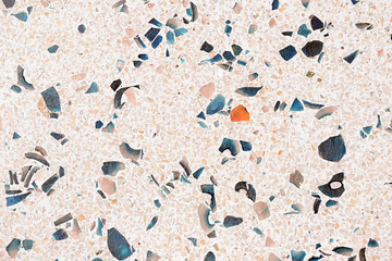 Floor and walls decorated with stone and colored glass.