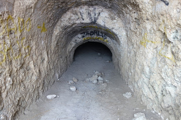 Fototapeta premium entrance to a small cave