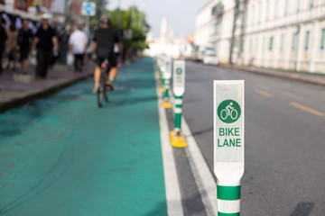 Bicycle lane pole sign on the street