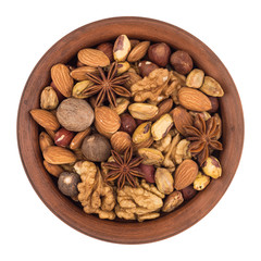 Mixture of nuts in a brown plate. Isolated on white background.
