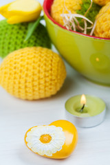 Fototapeta na wymiar Green yellow crocheted easter eggs