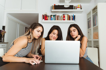 Women browsing a laptop