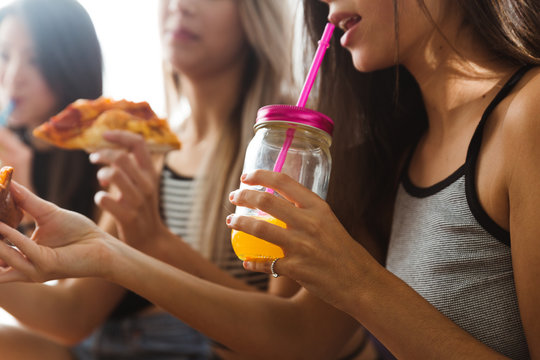 Three eating women
