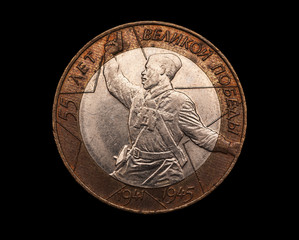 Russian commemorative bimetal coin isolated on black