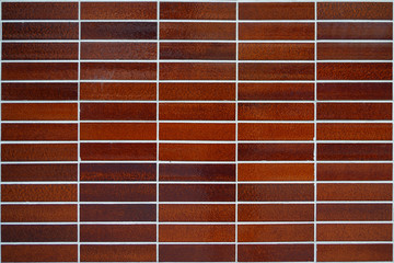 Rectangular brown glossy tiles..Tile background