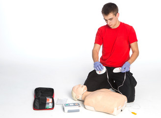 Paramedic demonstrate Cardiopulmonary resuscitation (CPR) on  dumm
