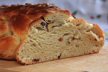 Traditional Czech Christmas cake with candles in the background