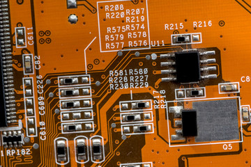 Electronic electronic circuit as background orange.
