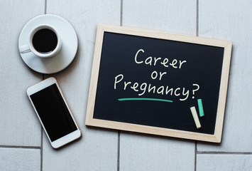 Chalkboard or Blackboard concept saying - CAREER or PREGNANCY?